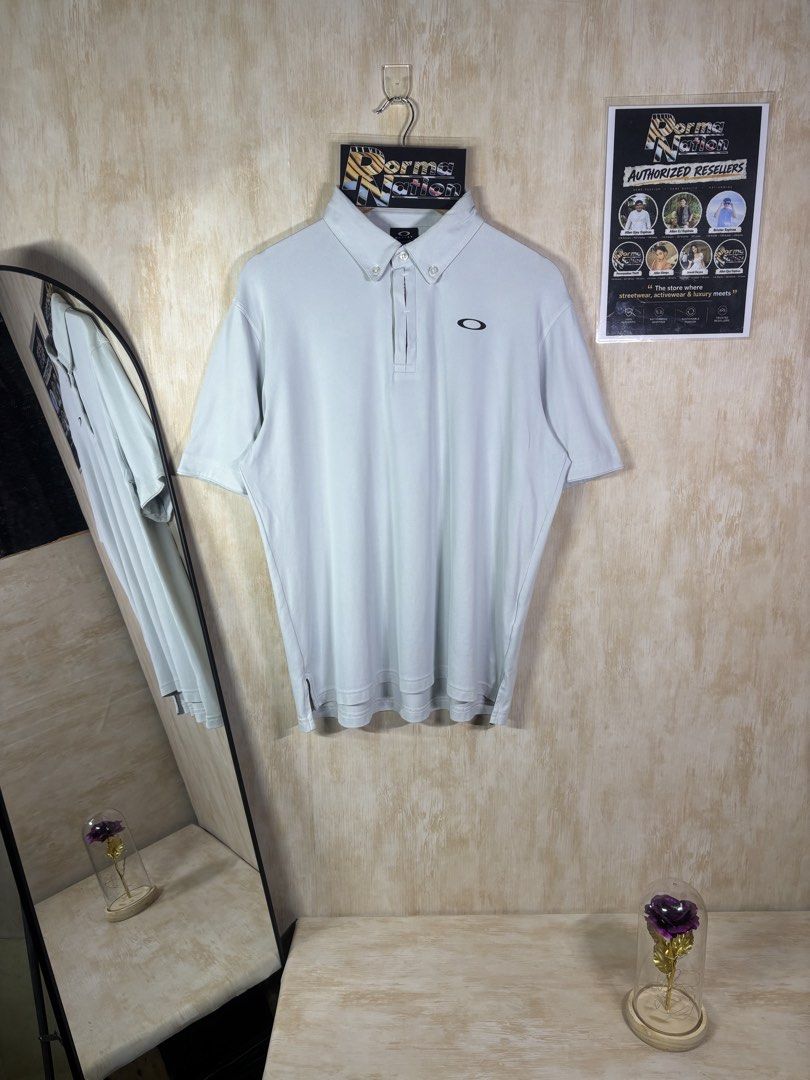 OAKLEY PERFORMANCE FIT POLO SHIRT (Category: Tshirts & Polo Shirts ) located in Cabuyao City. Submitted by pormanation-thrift-store (Listing ID 1465196745, Image 1). Description: OAKLEY PERFORMANCE FIT POLO SHIRT Condition: EXCELLENT Color rate: 9.5/10 Size: LARGE Dimes: 23”Wx27-28”L Issue: NONE❌ Price: 1500.