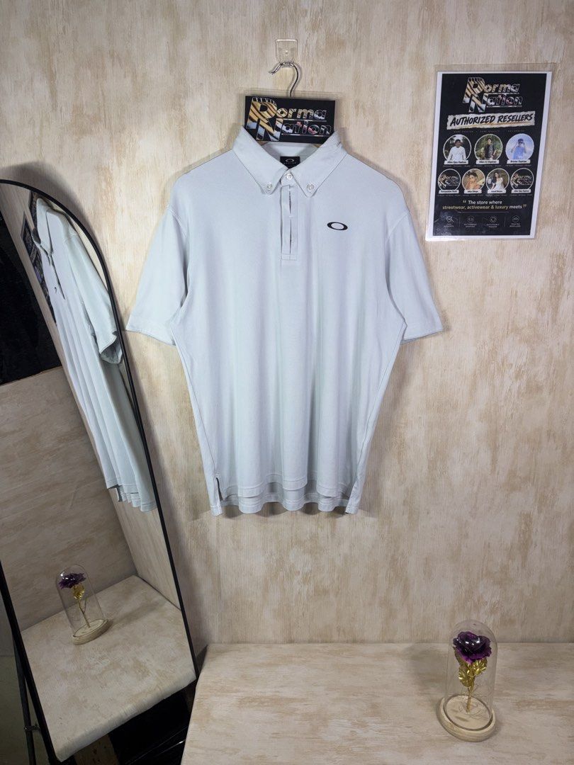 OAKLEY PERFORMANCE FIT POLO SHIRT (Category: Tshirts & Polo Shirts ) located in Cabuyao City. Submitted by pormanation-thrift-store (Listing ID 1465196745, Image 3). Description: OAKLEY PERFORMANCE FIT POLO SHIRT Condition: EXCELLENT Color rate: 9.5/10 Size: LARGE Dimes: 23”Wx27-28”L Issue: NONE❌ Price: 1500.