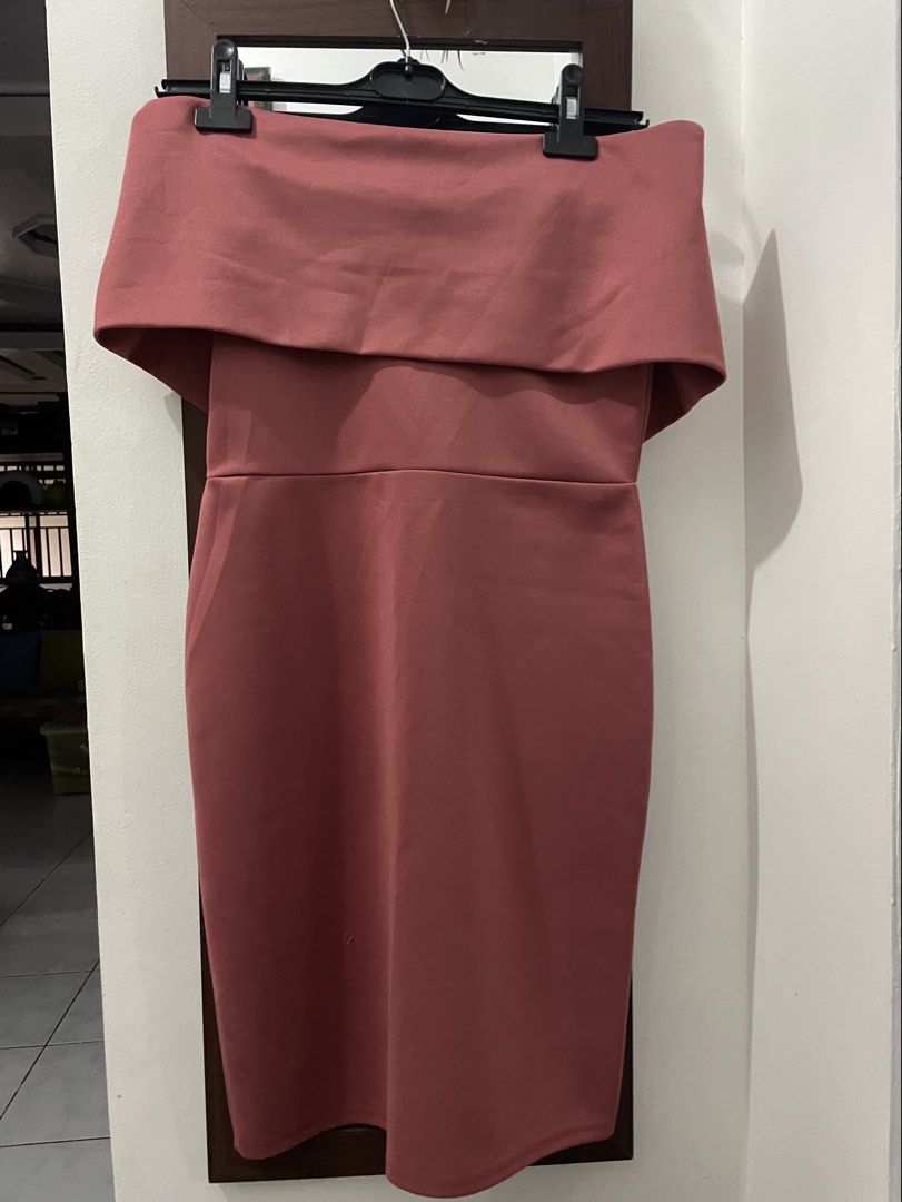 Formal Dress | Off-shoulder (Category: Dresses) located in Indang. Submitted by itsginnpom (Listing ID 1465260290, Image 1). Description: - Color: Dusty pink - Style: Off-shoulder bodycon dress with folded collar detail - Length: Knee-length - Fabric: Thick and soft texture - Size: Fits Small to Medium frames well (Model height: 4'11) - Condition: Clean and ready to wear.