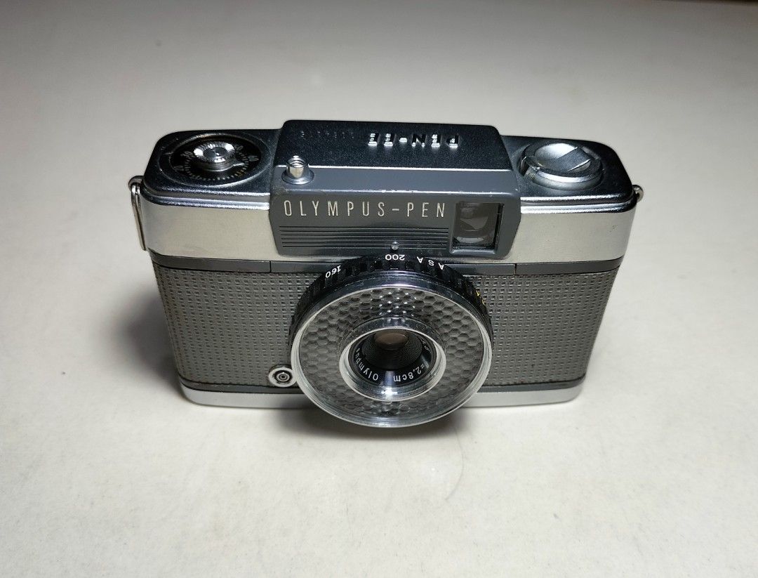 Olympus Pen-EE Half Frame Film Camera (Category: Cameras) located in Paranaque City. Submitted by zenfalcon.e8286d (Listing ID 1465348357, Image 2). Description: Ready to use...(PnS) -Good working condition -Clad recently -Clean lens and VF -Working light meter(Accurate -Exposure:Auto (Accurate) -All functions are working -Comes with wrist strap Presentable... .