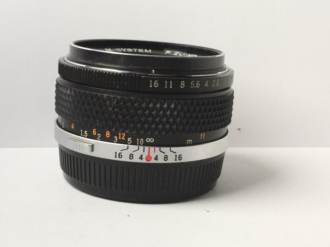 Olympus zuiko lens limited prodn (Category: Lens & Kits) located in Las Pinas. Submitted by film101 (Listing ID 1465206620, Image 3). Description: Olympus zuiko its a limited prodn lens its M-system model -its a semi less height than 2nd and 3rd model as compare -semi pancake lens -first version OLympus M-system F.Zuiko Auto -S 50mmf1.8 -minimum 0.45mm-10mm Inf -with lens cap and bottom cap --------/ Condition of lens Clean optixs ready to use Wi