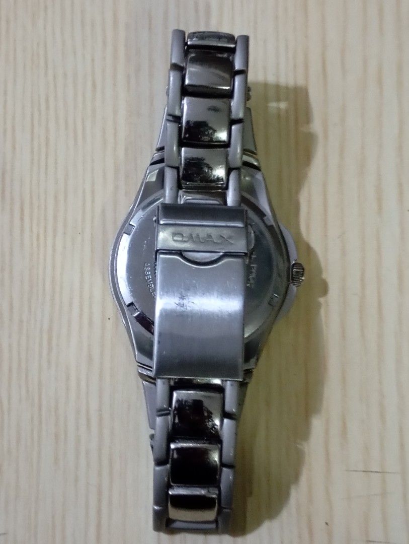 Omax crystal (Category: Men's Watches) located in Las Pinas. Submitted by quick_deals_great_finds2 (Listing ID 1465293170, Image 3). Description: Original good working condition Quartz with battery 38mm fits wrist 7.5 inches.