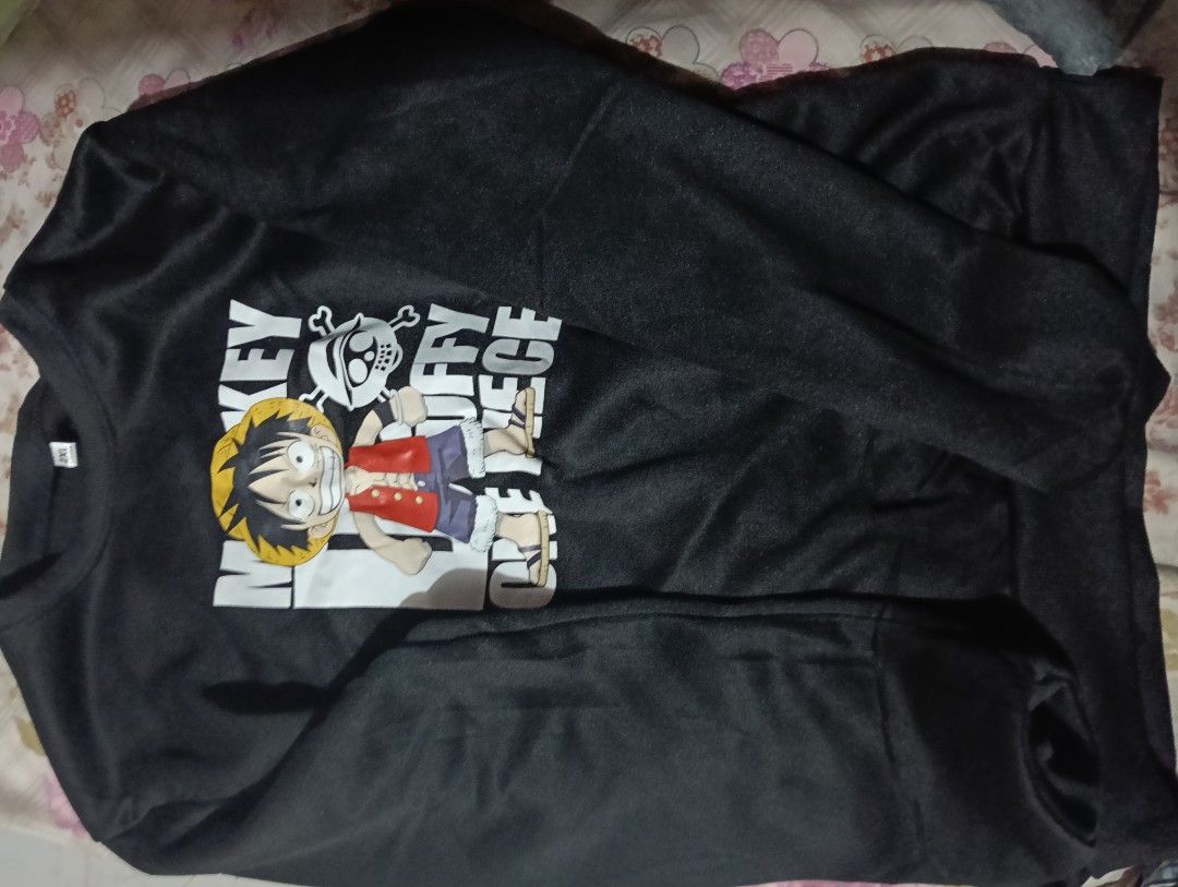One Piece Monkey D Luffy Black Long Sleeve Sweater 2XL (Category: Coats, Jackets and Outerwear) located in Manila. Submitted by rakelherms (Listing ID 1465311607, Image 1). Description: - Style: Casual long sleeve sweater - Design: Large Monkey D Luffy graphic with white block lettering - Details: Ribbed crewneck, cuffs, and hem - Size: 2XL - Comfort: Soft fabric on the inside, great for everyday wear.