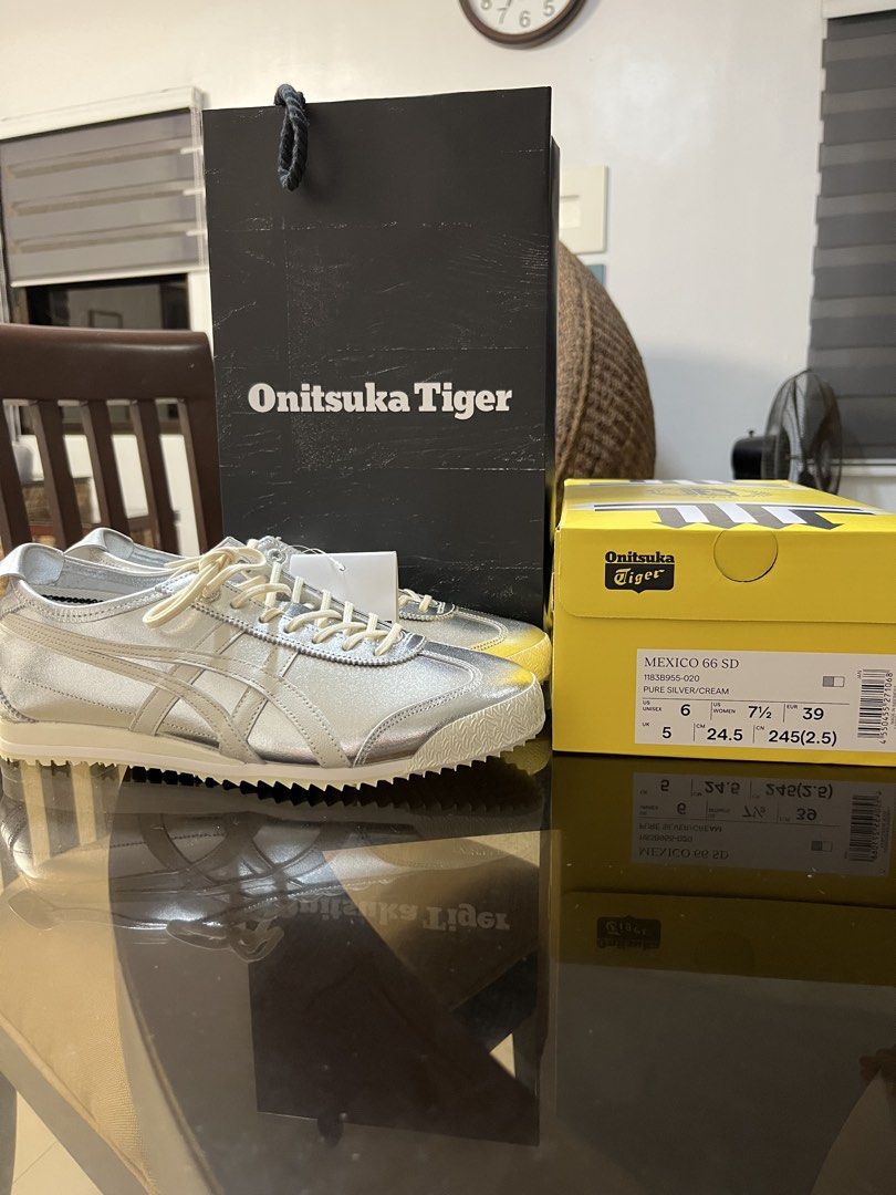 Onitsuka Tiger Mexico 66 SD Pure Silver Cream (Category: Sneakers) located in San Fernando. Submitted by vielviste (Listing ID 1465259088, Image 1). Description: Onitsuka Tiger Mexico 66 SD in pure silver and cream. Metallic silver finish with cream laces and detailing. Size US Unisex 6, US Women 7.5, EUR 39, UK 5, CM 24.5. Brand new in original yellow box, tags still attached. Includes Onitsuka Tiger paper bag. still negotiable .