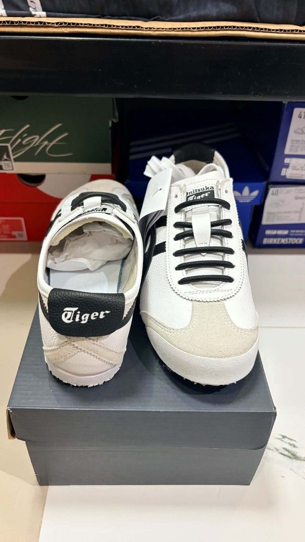 Onitsuka Tiger Mexico 66 White Black (Category: Sneakers) located in Imus. Submitted by alecsssss (Listing ID 1465201655, Image 3). Description: - Brand: Onitsuka Tiger - Model: Mexico 66 - Color: White with Black stripes and suede trim - Size: US 8 / EUR 41.5 - Condition: Brand new with original shoebox and tags - Style: Classic low-top sneaker.