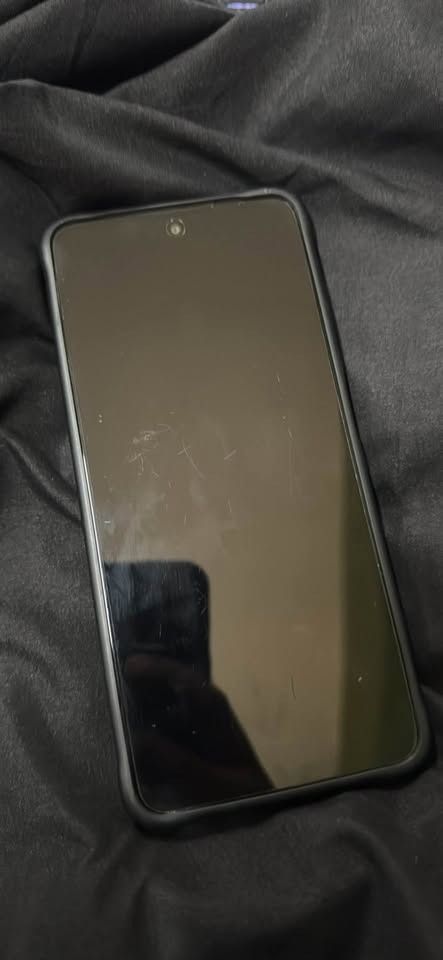 Oppo A5i pro (Category: OPPO) located in Adams. Submitted by tachikawataiga (Listing ID 1465375682, Image 2). Description: Oppo A5i Pro Midnight Purple Pristine condition, 99% smooth, alagang alaga. 128gb inclusion: phone, charger, native case additional specs on manufacturer site. Screen film protected since day one. Phone case protected since day one. No issue except: - small dent on the power button and - case mark around the camera. does not 