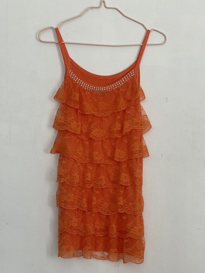 Orange Layered Cami Top (Category: Sleeveless) located in Tuguegarao City. Submitted by ziggerryy (Listing ID 1465370886, Image 1). Description: No flaws. No holes S-M.