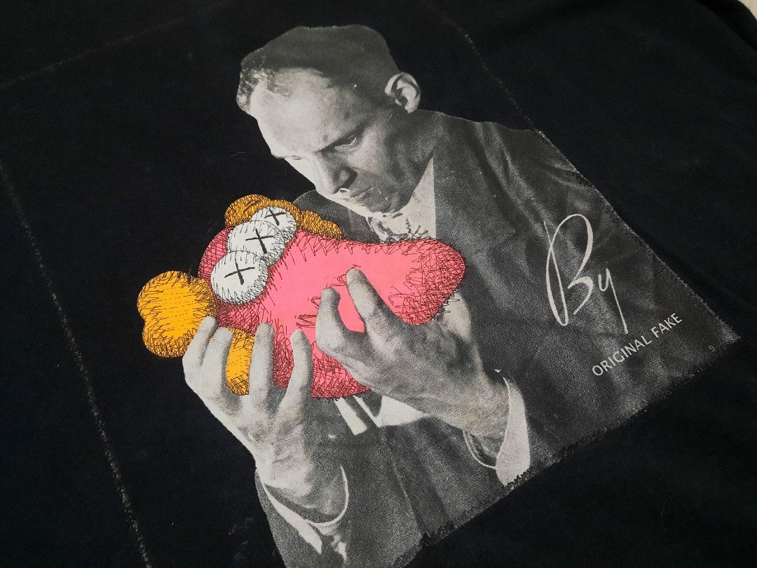 kaws graphic tee (Category: Tshirts & Polo Shirts ) located in Tarlac. Submitted by thryftstash (Listing ID 1465352799, Image 3). Description: dimes: 28-21 3 on tag issue: minimal discoloration & small stain sf not included tarlac loc j&t and lbc courier.