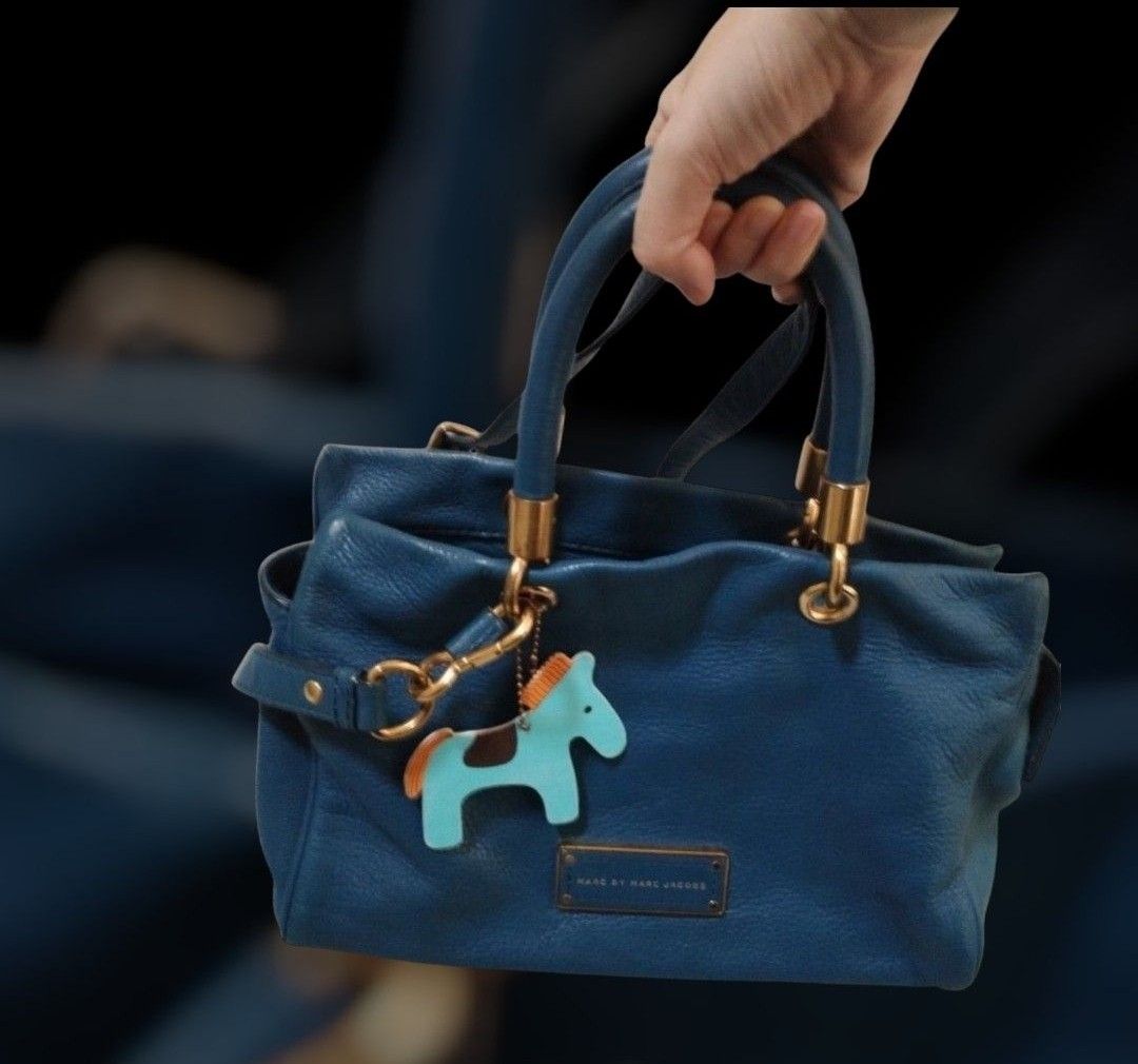 Original Marc by Marc Jacobs Satchel bag (Category: Luxury Bags & Wallets) located in San Juan City. Submitted by exclusivelyours (Listing ID 1465278125, Image 1). Description: Marc by Marc Jacobs "Classic Q" line (a hugely popular line from the late 2000s to mid-2010s era before the Marc by Marc Jacobs diffusion line was discontinued). ▪️ ​Material: Supple, heavy-grained pebbled cowhide leather. ▪️ ​Hardware: Antiqued brass/gold-tone hardware, f
