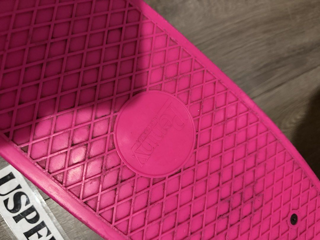 Original Penny Board Australia size 22" (Category: Skates, Rollerblades & Scooters) located in Makati City. Submitted by uspence (Listing ID 1465205338, Image 3). Description: - 100% authentic Penny Skateboard from Australia - Bright pink deck with classic waffle grip pattern - Purple trucks and dark green wheels - Condition: Shows scuffs on deck Still useable Changed bearings (Still have the original penny bearings will include) Needs cleaning S