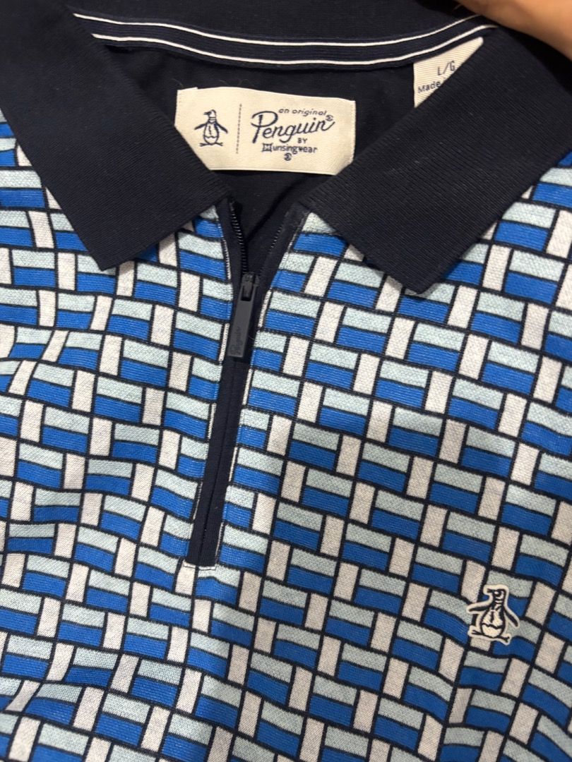 Original Penquin ZipUp Polo (Category: Formal Shirts) located in Caloocan City. Submitted by joaquinjoseph (Listing ID 1465218591, Image 3). Description: Original Penguin ZipUp Polo 🔵⚪ • Size: Large (L) • Good condition • Unique blue/white geometric pattern • Original Penguin • ₱600 • Rush sale • MOP: GCash / Cash • Meet-up or shipping available (Paranaque Location).