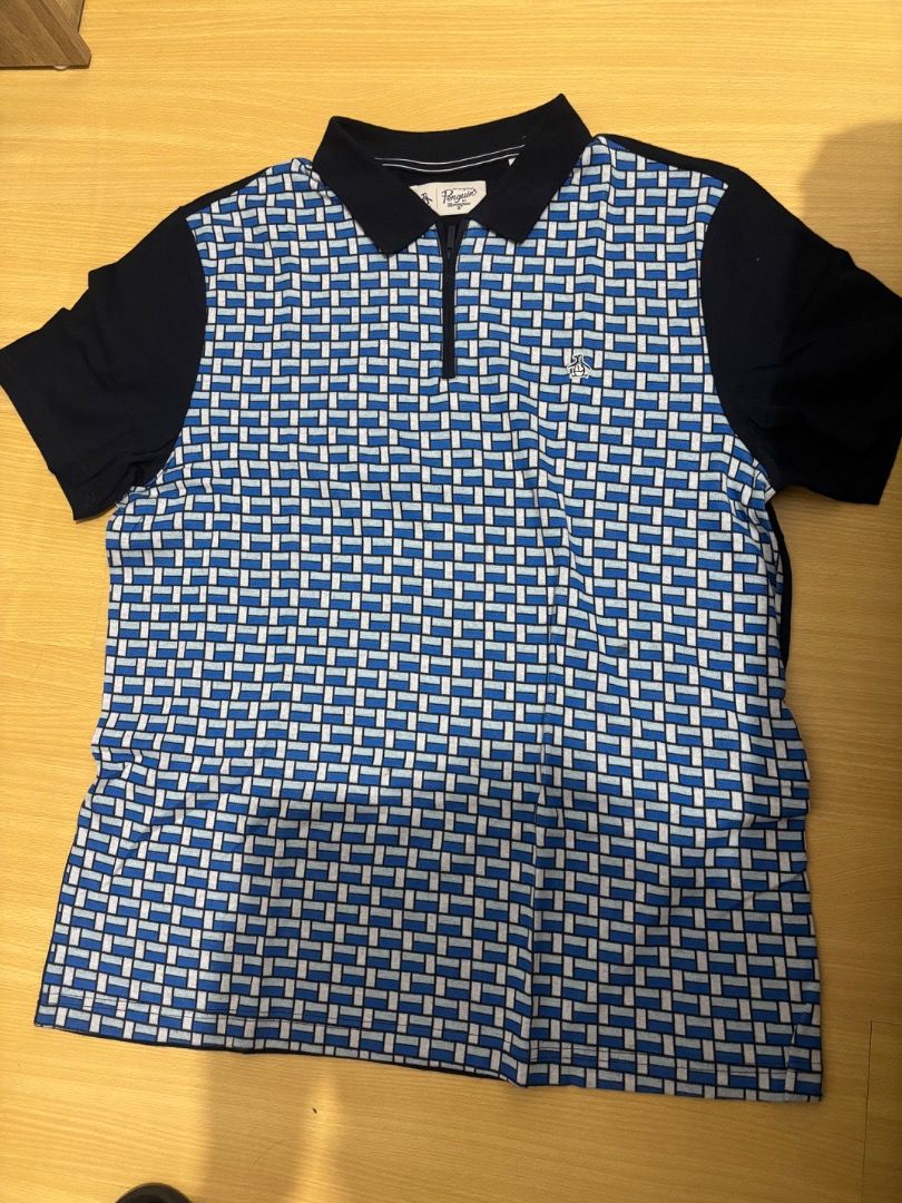 Original Penquin ZipUp Polo (Category: Formal Shirts) located in Caloocan City. Submitted by joaquinjoseph (Listing ID 1465218591, Image 2). Description: Original Penguin ZipUp Polo 🔵⚪ • Size: Large (L) • Good condition • Unique blue/white geometric pattern • Original Penguin • ₱600 • Rush sale • MOP: GCash / Cash • Meet-up or shipping available (Paranaque Location).