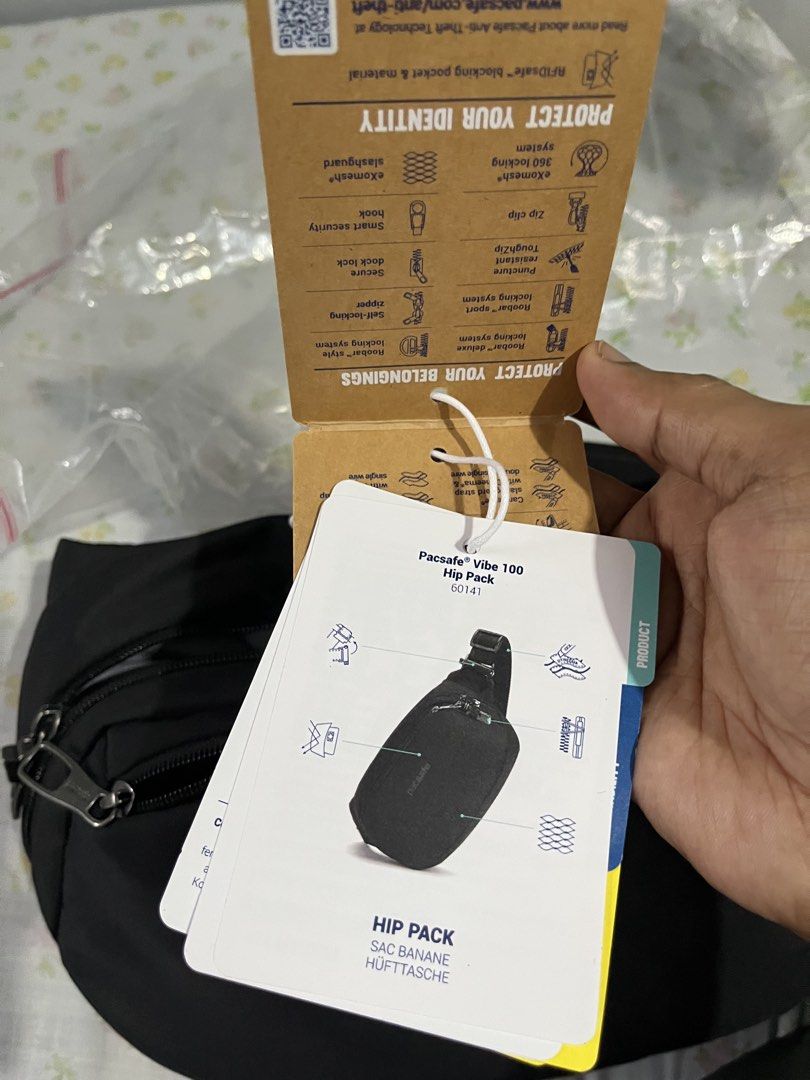 Pacsafe Vibe 100 Hip Pack Jet Black (Category: Belt bags, Clutches and Pouches) located in Pasay City. Submitted by robert.irwin (Listing ID 1465176988, Image 3). Description: • Item: Pacsafe Vibe 100 Hip Pack • Color: Jet Black • Condition: Brand new with original tags • Retail Price: ₱5,590 (printed on tag) • Security Features: Anti-theft design and built-in RFID blocking pocket • Storage: Multiple zippered compartments and internal pockets for