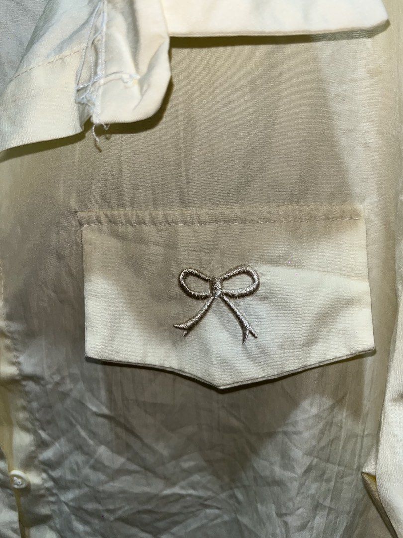 Pastel Yellow Button-Down Set/Coords (Category: Sets or Coordinates) located in Rizal. Submitted by bypc5678 (Listing ID 1465356252, Image 3). Description: - Med to Large (semi xl) - Lightweight fabric with relaxed fit - Embroidered bow detail on both chest pockets .