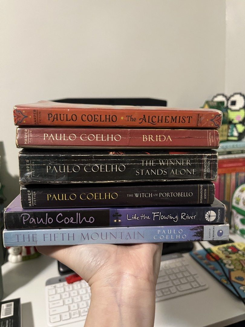 Paulo Coelho Boom Set | Pre-loved (Category: Storybooks) located in Manila. Submitted by keroppiverse (Listing ID 1465340477, Image 1). Description: - Bundle of 6 bestselling Paulo Coelho novels - Includes: The Alchemist (25th Anniversary Ed.), Brida, The Winner Stands Alone, The Witch of Portobello, Like the Flowering River, and The Fifth Mountain - Format: English paperbacks (Harper Fiction & Thorsons) - Condition: Minor wear on spine edges and
