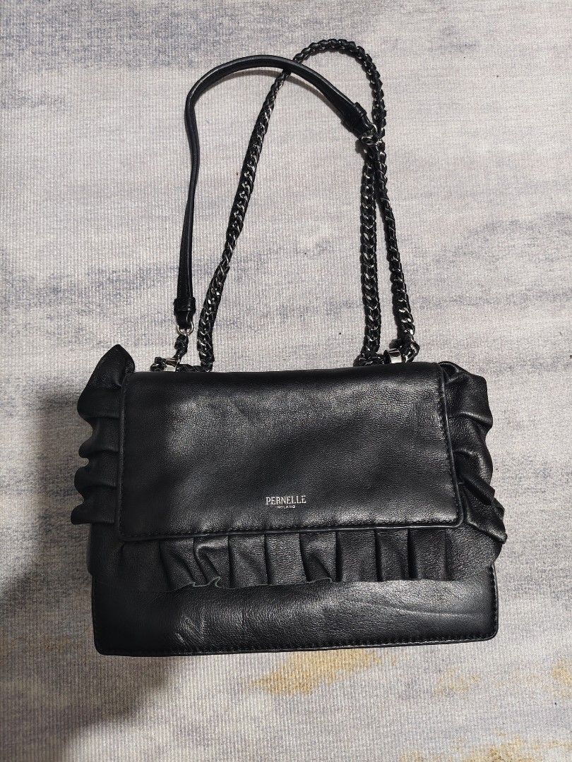 Pernelle Milano leather sling / shoulder bag (Category: Cross-body Bags) located in Baguio. Submitted by igorotak.111.taraki.com (Listing ID 1465289189, Image 1). Description: FS Pernelle Milano leather sling / shoulder bag V.good condition wth minimal sign if use see pics for appreciation thankyou po🙏 ganda nito ♥️.