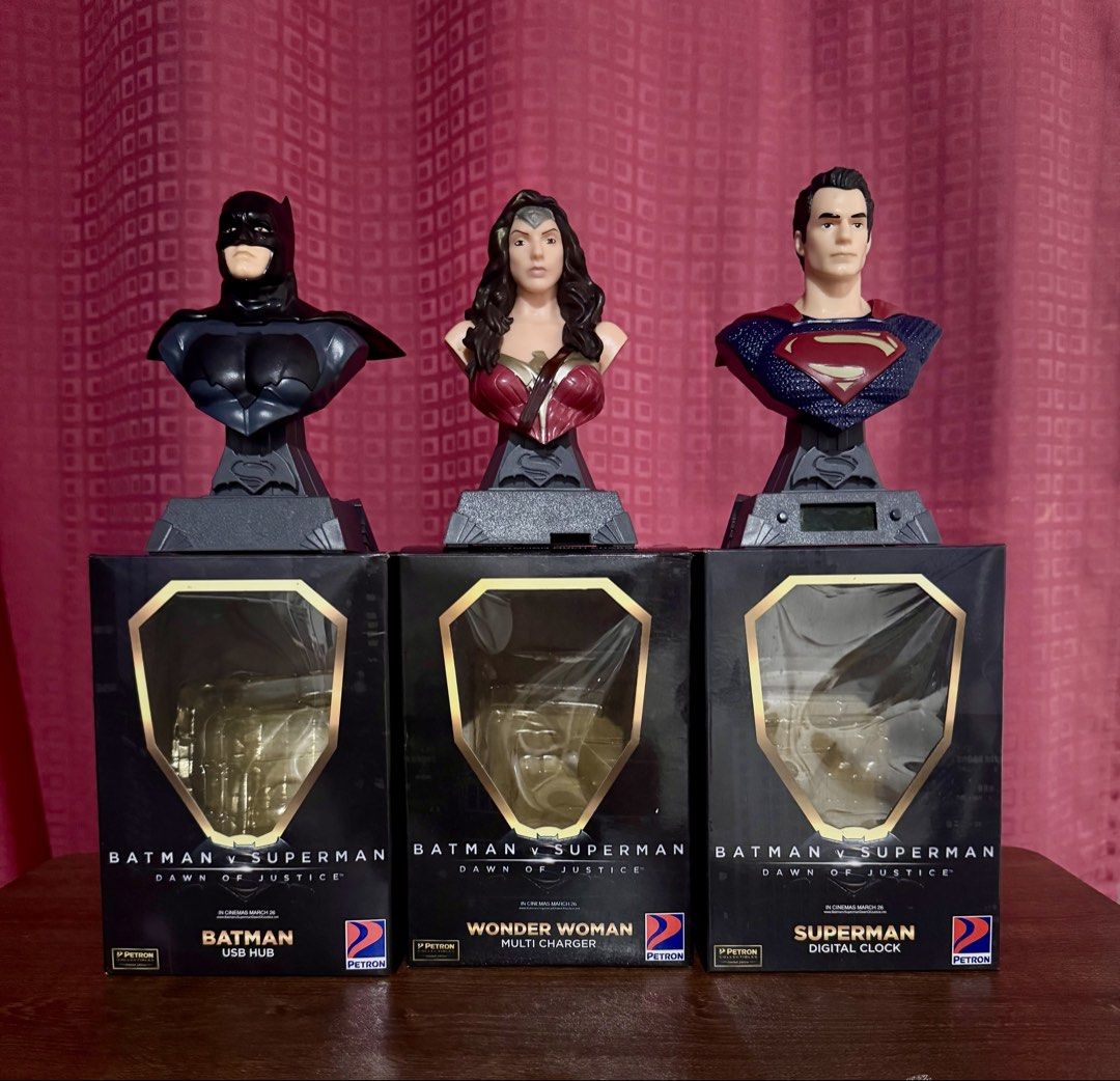 Petron Bust Collection Set of 3 (Category: Figurines & Statues) located in Manila. Submitted by elegancemnl (Listing ID 1465195085, Image 1). Description: - Complete set of 3 Petron Batman v Superman busts - Includes Batman USB hub, Wonder Woman multi-charger, and Superman digital clock - Comes with original matching boxes for each figure - Great display pieces for DC fans and collectors -SOLD AS SET (3 pcs).