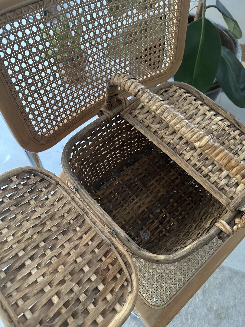 Picnic Basket with Double Lids (Category: Storage Boxes & Baskets) located in Manila. Submitted by decluttering.anj (Listing ID 1465180310, Image 3). Description: - Natural woven wicker with an earthy brown tone and rustic texture - Sturdy central handle and two separate hinged lids that open outwards - Perfect for outdoor picnics, romantic dates, home storage or as photoshoot props (Was used for photoshoot purposes only).
