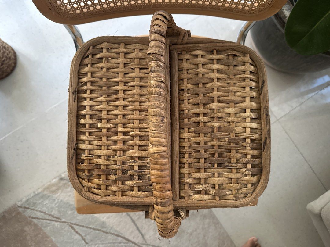 Picnic Basket with Double Lids (Category: Storage Boxes & Baskets) located in Manila. Submitted by decluttering.anj (Listing ID 1465180310, Image 2). Description: - Natural woven wicker with an earthy brown tone and rustic texture - Sturdy central handle and two separate hinged lids that open outwards - Perfect for outdoor picnics, romantic dates, home storage or as photoshoot props (Was used for photoshoot purposes only).