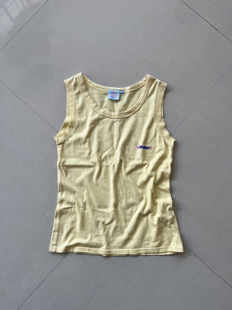 PIKO YELLOW TANK TOP (Category: Shirts) located in Magarao. Submitted by chalkzone20 (Listing ID 1465188177, Image 2). Description: PIKO YELLOW TANK TOP Size: Large on tag Condition: 9.5/10 Color rate: 9.5/10 Excellent condition Made in Unknown Dimensions: 15 x 23 350+sf .