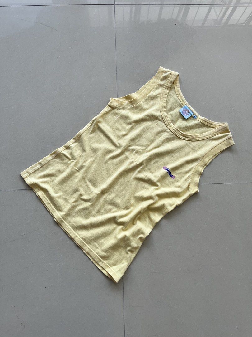 PIKO YELLOW TANK TOP (Category: Shirts) located in Magarao. Submitted by chalkzone20 (Listing ID 1465188177, Image 3). Description: PIKO YELLOW TANK TOP Size: Large on tag Condition: 9.5/10 Color rate: 9.5/10 Excellent condition Made in Unknown Dimensions: 15 x 23 350+sf .