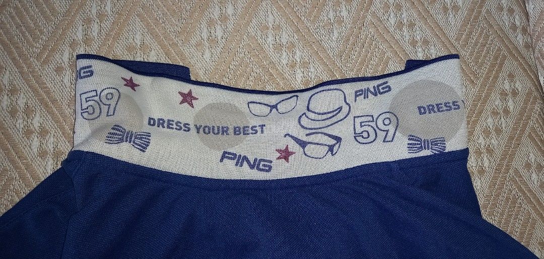 PING Collection Polo Shirt Blue with Patterned Collar Size 100 (Category: Tshirts & Polo Shirts ) located in Cagayan de Oro. Submitted by edwardryan01984 (Listing ID 1465291513, Image 3). Description: - Brand: PING Collection - Color: Blue with maroon and white details - Size: 100 (Standard Fit) - Design: Contrasting white patterned collar with graphics, numbers '59', and 'DRESS YOUR BEST' text - Features: Maroon inner placket with buttons, short