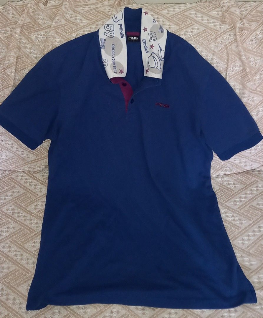 PING Collection Polo Shirt Blue with Patterned Collar Size 100 (Category: Tshirts & Polo Shirts ) located in Cagayan de Oro. Submitted by edwardryan01984 (Listing ID 1465291513, Image 1). Description: - Brand: PING Collection - Color: Blue with maroon and white details - Size: 100 (Standard Fit) - Design: Contrasting white patterned collar with graphics, numbers '59', and 'DRESS YOUR BEST' text - Features: Maroon inner placket with buttons, short
