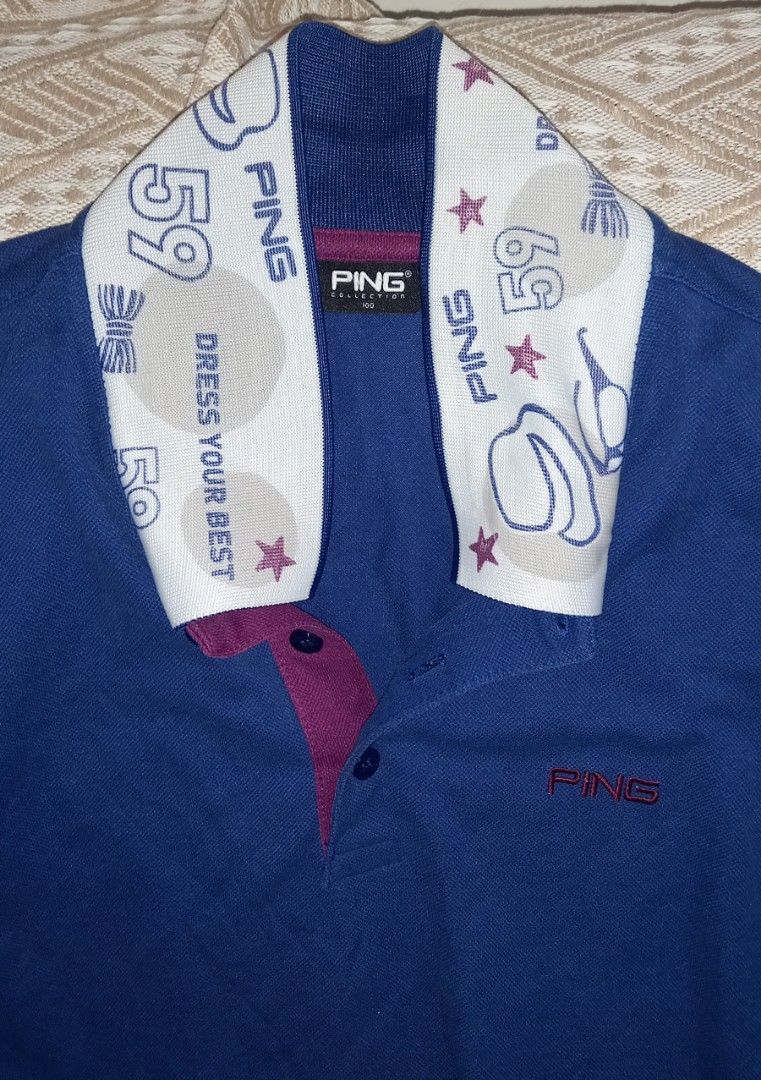 PING Collection Polo Shirt Blue with Patterned Collar Size 100 (Category: Tshirts & Polo Shirts ) located in Cagayan de Oro. Submitted by edwardryan01984 (Listing ID 1465291513, Image 2). Description: - Brand: PING Collection - Color: Blue with maroon and white details - Size: 100 (Standard Fit) - Design: Contrasting white patterned collar with graphics, numbers '59', and 'DRESS YOUR BEST' text - Features: Maroon inner placket with buttons, short