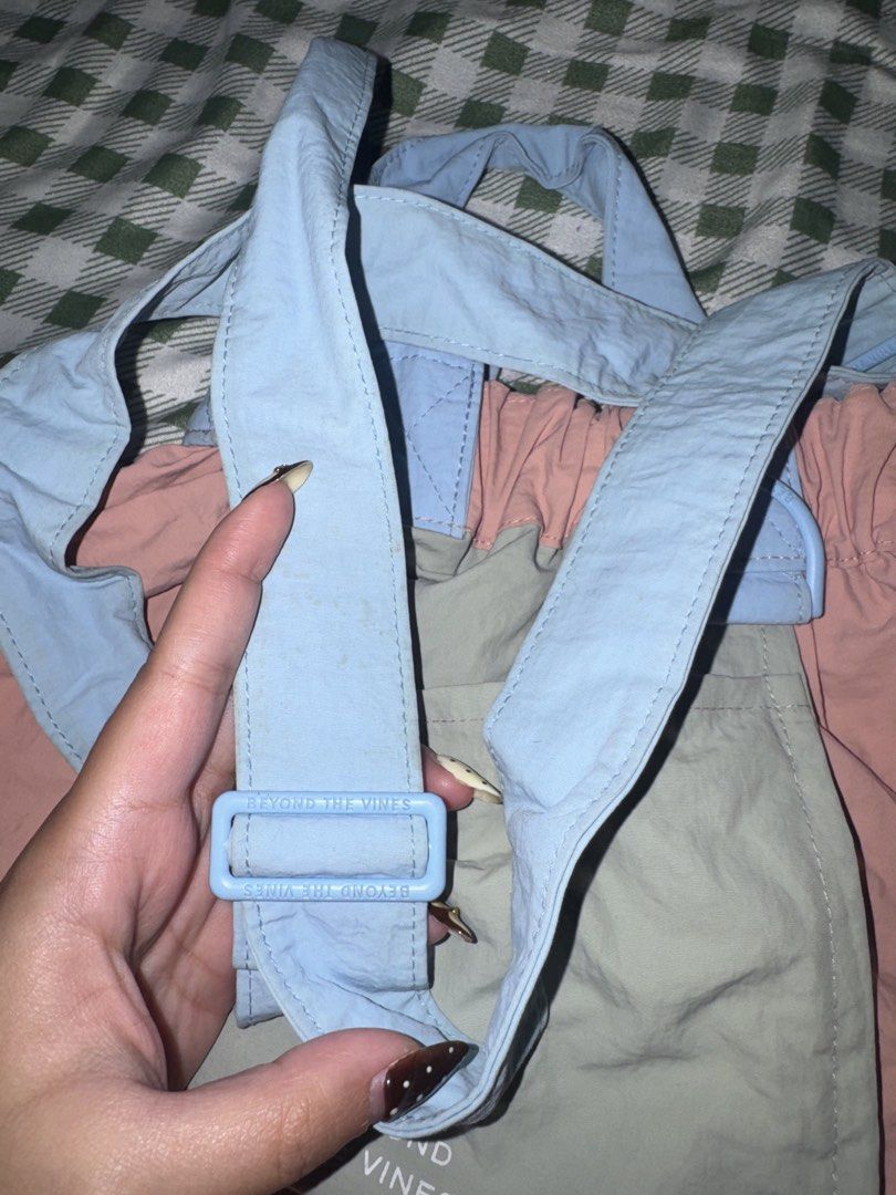 Pink/Blue Colorway Sling Bag (Category: Cross-body Bags) located in Quezon City. Submitted by mkl.p (Listing ID 1465206043, Image 2). Description: - got this from the 🍊 app - BTV INSPIRED - no flaws! needs a little bit of cleaning lang since nakatago and di nagagamit - magnet lock - with front pocket - adjustable straps - used once or twice only - no pockets inside - good as new - spacious inside loc: timog qc.