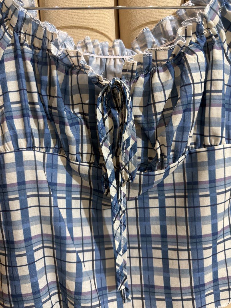 Plaid Milkmaid Croptop (Category: Blouses) located in Manila. Submitted by glamstylemnl (Listing ID 1465319798, Image 3). Description: ♡ SIZE: S ♡ BUST: 32 ♡ Swipe left to see the actual color & details ♡ Ruffled cap sleeves / front tie ♡ HQ • 10/10 ♡ Ready to wear 👚.