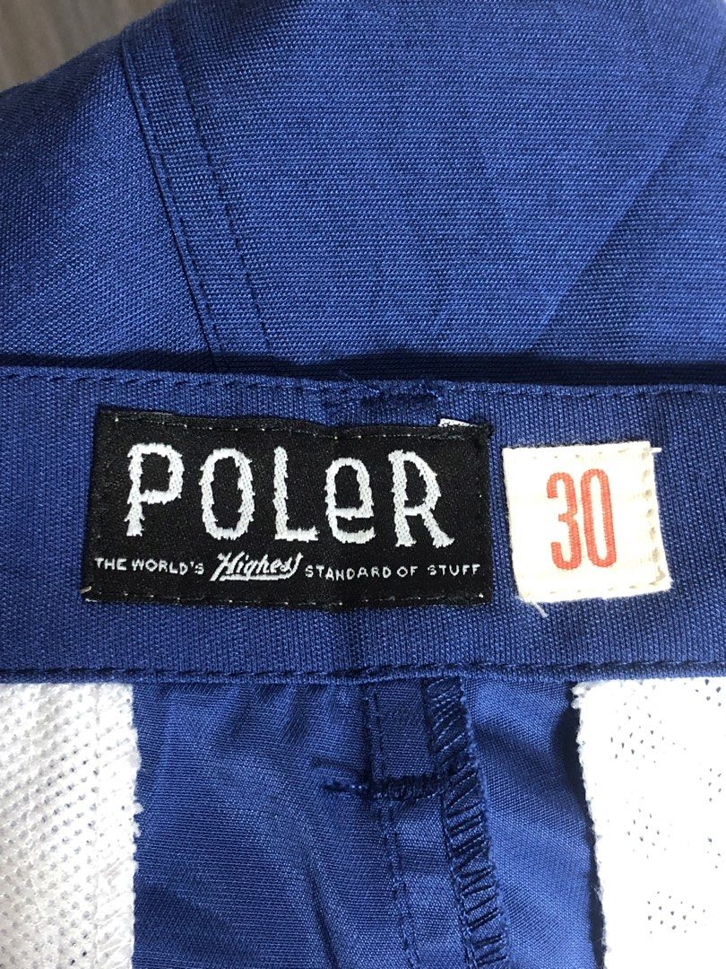 Poler Blue Shorts Size 30 (Category: Shorts) located in Montevista. Submitted by rdthriftshub (Listing ID 1465275053, Image 3). Description: - Brand: Poler - Color: Bright blue - Size: 30 waist - Closure: Standard button with zipper fly - Pockets: Two front pockets, two back pockets - Condition: Clean, no tears or stains.