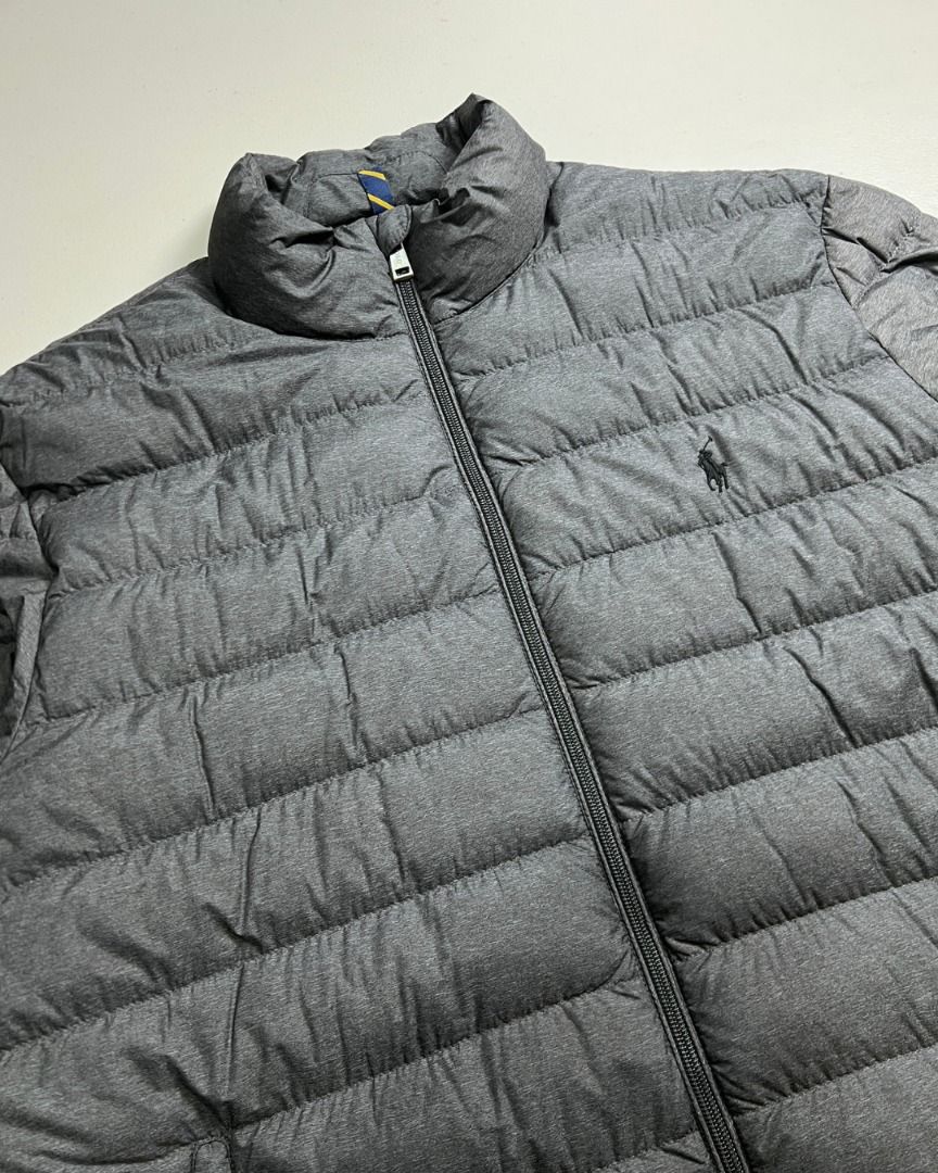 Polo Ralph Lauren Grey Lightweight Bleeker Packable Down Jacket (Category: Coats, Jackets and Outerwear) located in Baguio. Submitted by marcusmartin2600 (Listing ID 1465186731, Image 3). Description: Size: Large on tag Condition: Excellent 📏 Measurement via Tape Measure (in inches): Width: 24.5” Length: 26” Shoulders: 20.5” Sleeve Length: 26.5” Hem: 21” . Note: Please check detailed photos before bidding to avoid cancellations. Also available a