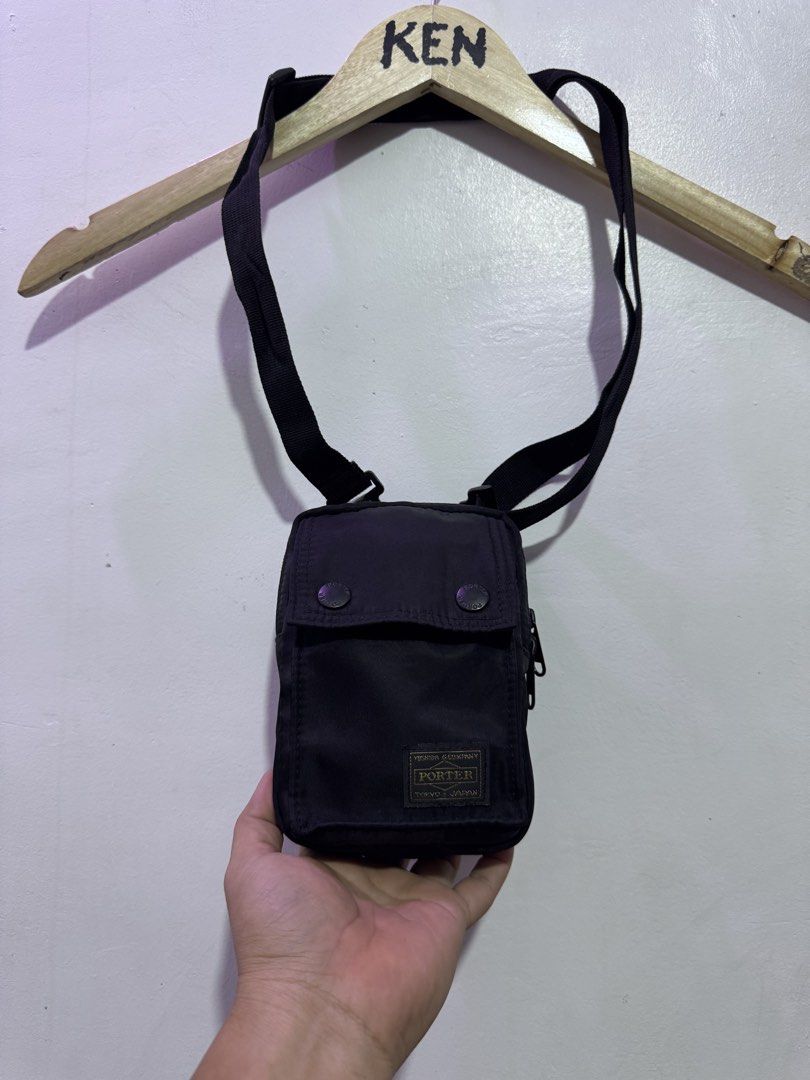 Porter Yoshida & Co. Black Nylon Multi Way Sling Bag (Category: Sling Bags) located in Manila. Submitted by esparciake75752 (Listing ID 1465304671, Image 2). Description: - Brand: Porter Yoshida & Co. - Color: Black Nylon - Storage: Front snap-button flap pocket and secure main zipped compartment - Versatility: Sturdy woven strap with clips, plus a back buckle closure and loop attachment - Condition: Clean all around, great for everyday essential