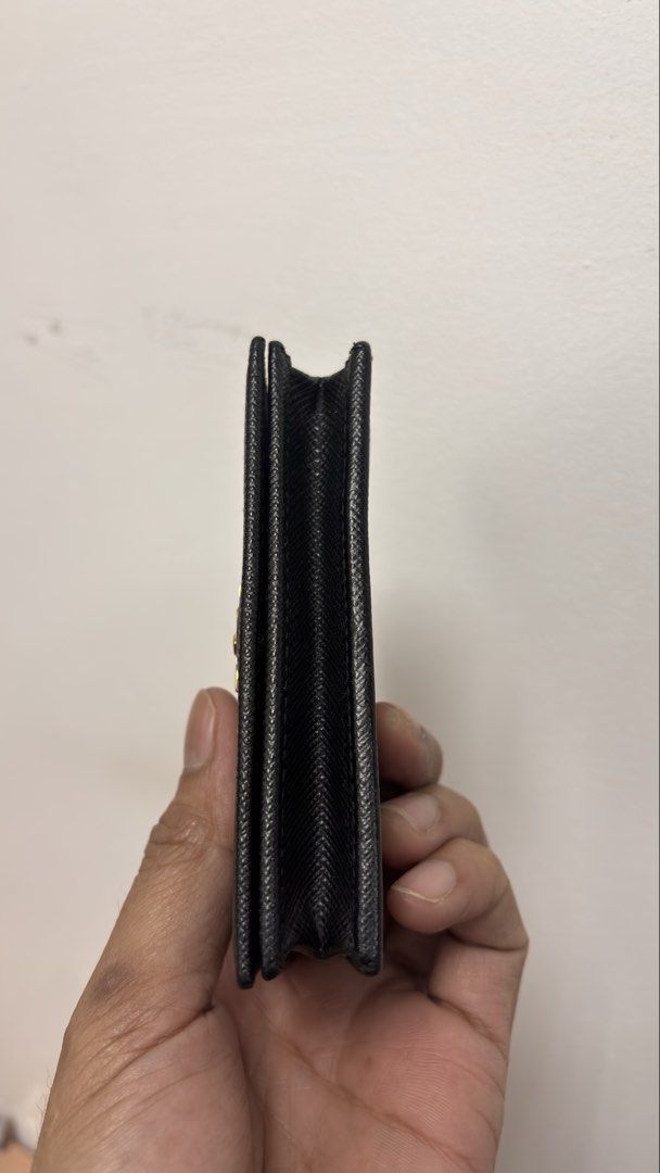 PRADA Black saffiano Card Holder (Category: Luxury Bags & Wallets) located in Taguig. Submitted by shoppersluxe2394 (Listing ID 1465198824, Image 2). Description: .