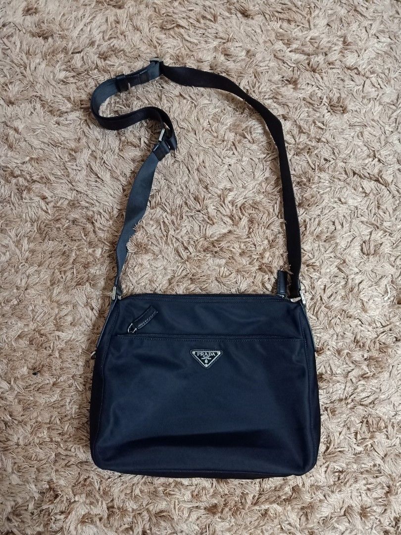 Prada cross body bag black (Category: Cross-body Bags) located in Binmaley. Submitted by fashionluxury058 (Listing ID 1465274844, Image 1). Description: prada cross body bag black almost new... size: medium color black unisex.