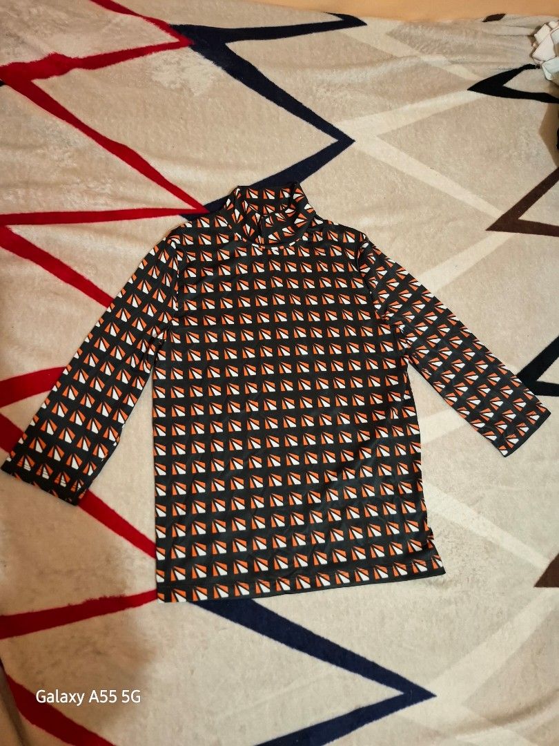 PRADA LONGSLEEVE TURTLE NECK (Category: Coats, Jackets and Outerwear) located in Antipolo. Submitted by goldentiger-ac44 (Listing ID 1465272526, Image 1). Description: PRDA LONGSLEEVE TURTLE NECK FOR WOMEN'S Size small Good as condition Antipolo city location.