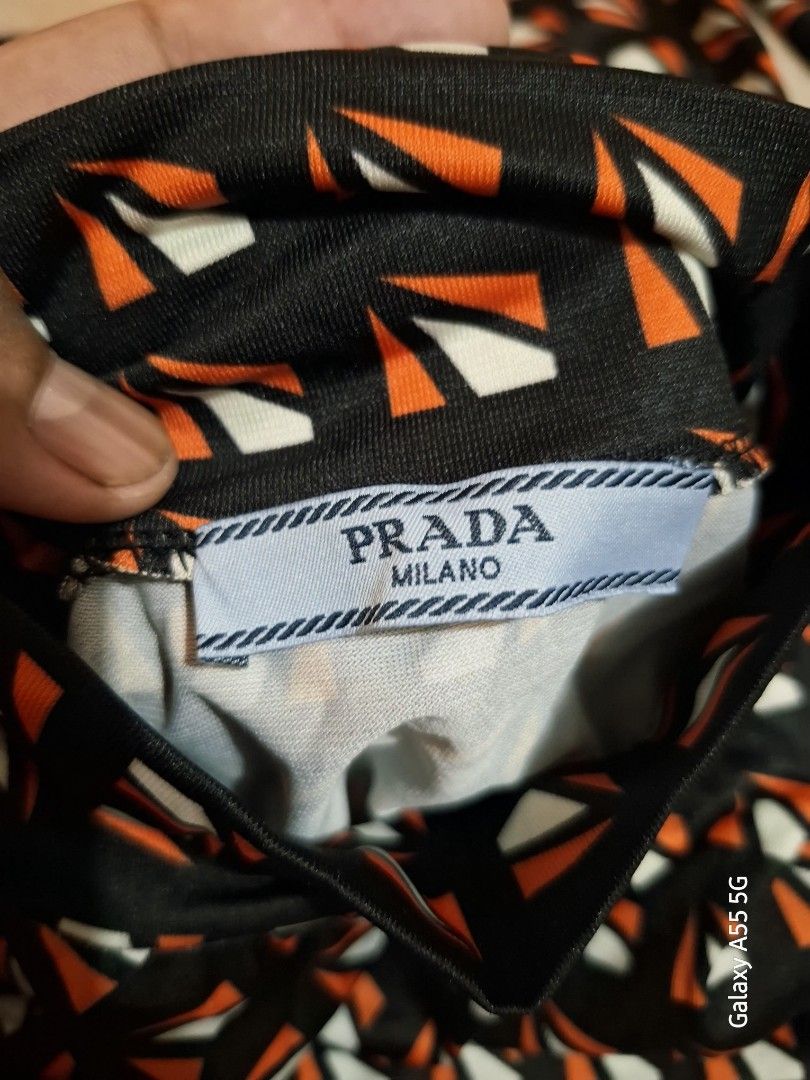 PRADA LONGSLEEVE TURTLE NECK (Category: Coats, Jackets and Outerwear) located in Antipolo. Submitted by goldentiger-ac44 (Listing ID 1465272526, Image 2). Description: PRDA LONGSLEEVE TURTLE NECK FOR WOMEN'S Size small Good as condition Antipolo city location.