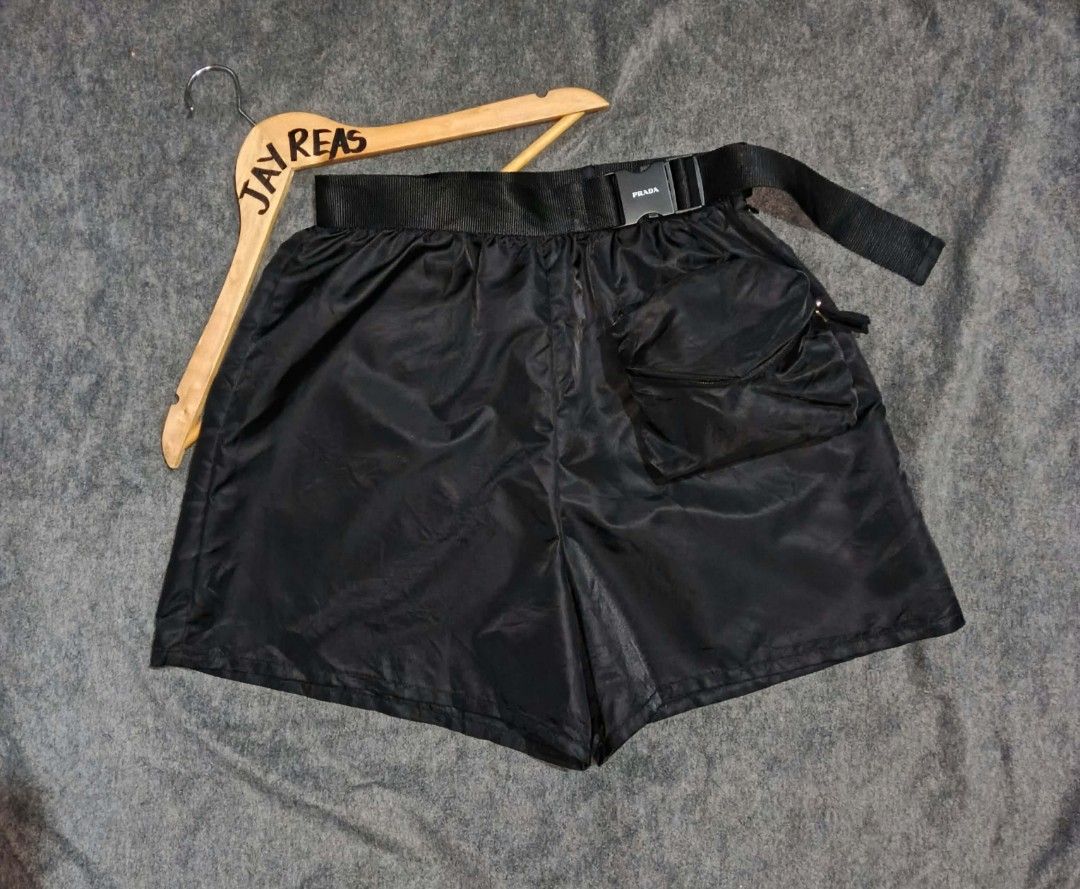 Prada Re-Nylon Gabardine Shorts (Category: Luxury Apparel) located in Kananga. Submitted by jayreas1517 (Listing ID 1465322715, Image 2). Description: Good as new size 38 on tag waistline 28 length 16 10/10 condition no issue .