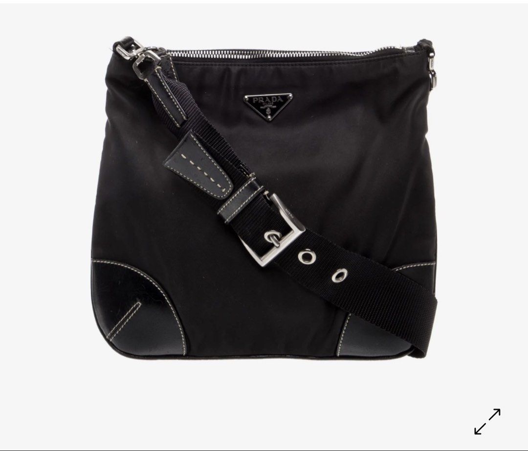 Prada sling bag (Category: Luxury Bags & Wallets) located in Bacolod City. Submitted by hanap_ukay_540 (Listing ID 1465196993, Image 1). Description: Prada tessuto nylon cross body bag Authentic Sign of used only Cut white tag but authentic, check each photo to see the details Location: Bacolod City Negros aocc Unli video call or vouch or smooth and safety transactions Dm me if interested 📥.