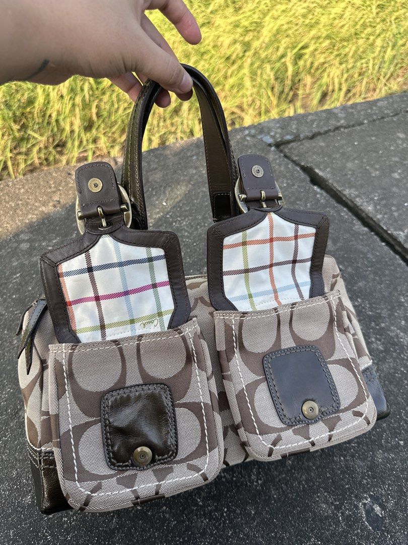 Preloved Coach Bleeker Satchel (Category: Luxury Bags & Wallets) located in Manila. Submitted by glesylbd_22 (Listing ID 1465220193, Image 2). Description: - See last photo for minimal sign of use - No other issues, - Authentic Coach signature canvas handbag in classic brown - Dark patent leather trim, handles, and brass-tone hardware - Two front utility pockets with buckle closures and playful plaid flaps - Colorful plaid interior lining with co