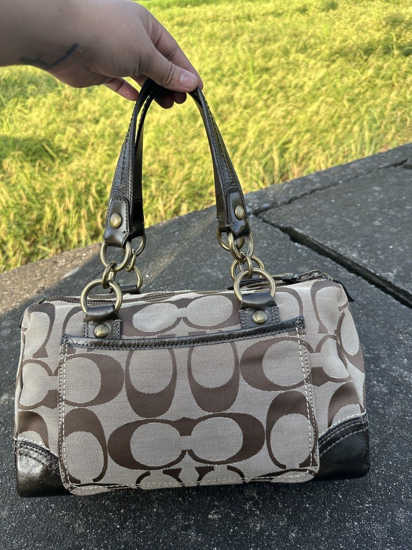 Preloved Coach Bleeker Satchel (Category: Luxury Bags & Wallets) located in Manila. Submitted by glesylbd_22 (Listing ID 1465220193, Image 3). Description: - See last photo for minimal sign of use - No other issues, - Authentic Coach signature canvas handbag in classic brown - Dark patent leather trim, handles, and brass-tone hardware - Two front utility pockets with buckle closures and playful plaid flaps - Colorful plaid interior lining with co