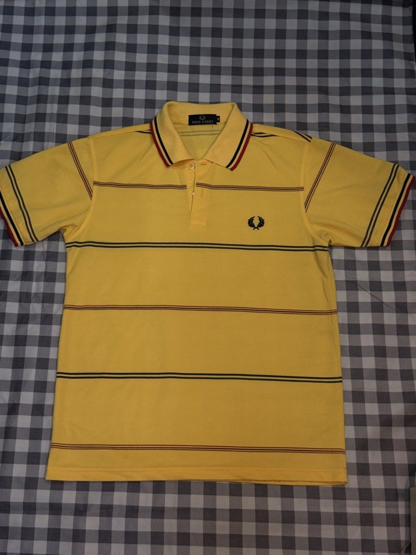 PRELOVED- FRED PERRY POLO ✨ (Category: Tshirts & Polo Shirts ) located in Abucay. Submitted by littlefindsbyb (Listing ID 1465381452, Image 1). Description: ✨ PRELOVED FRED PERRY POLO | SIZE M ✨ Classic, bright, and timeless — a statement polo that’s easy to style for casual or smart-casual looks. 📏 MEASUREMENTS (laid flat): • Chest: ~20–21” • Length: ~28” • Fit: Regular • Tagged Size: Medium (M) ✨ DETAILS: • Brand: Fred Perry • Vibrant yellow w