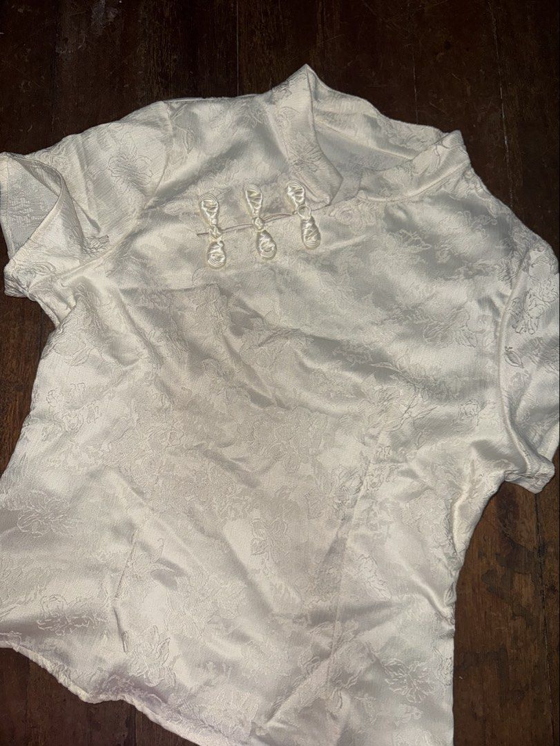 Preloved Shein Chinese Collar Shirt (Category: Shirts) located in Quezon City. Submitted by yochimoto_cart (Listing ID 1465295867, Image 1). Description: - Shein Preloved Shirts: Chinese Collar & Summer with cross-neck lace. Bundle of two shirts for P300 - Only used once in an international trip - Size: both are Large - Rfs: no other occassions to use it for - QC Loc .