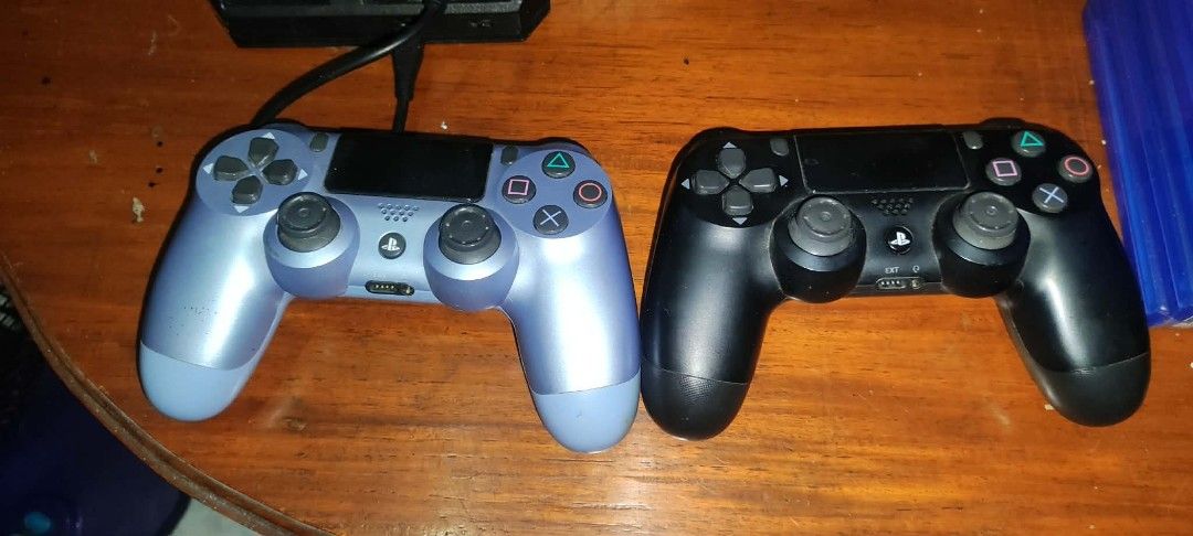 PS4 Console Bundle with VR Headset, Controllers, and Games (Category: PlayStation) located in Quezon City. Submitted by marky1969 (Listing ID 1465210039, Image 3). Description: For Sale Only... NEGOTIABLE L... - Complete PS4 setup, ready to plug and play - Includes PS4 console and official charging stand - PSVR headset with 2 Move controllers included ( Version 2) - 2 DualShock controllers (Blue-Grey and Black) - Massive game collection including
