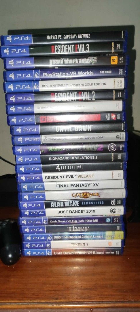 PS4 Console Bundle with VR Headset, Controllers, and Games (Category: PlayStation) located in Quezon City. Submitted by marky1969 (Listing ID 1465210039, Image 2). Description: For Sale Only... NEGOTIABLE L... - Complete PS4 setup, ready to plug and play - Includes PS4 console and official charging stand - PSVR headset with 2 Move controllers included ( Version 2) - 2 DualShock controllers (Blue-Grey and Black) - Massive game collection including