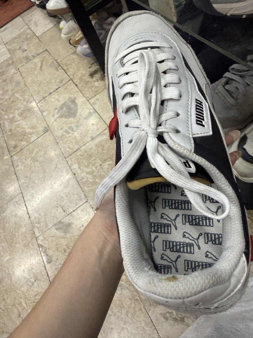 Puma Future Rider Sneakers White Black Red Size UK 8.5 (Category: Sneakers) located in Abucay. Submitted by fastlion.584bdf (Listing ID 1465360708, Image 2). Description: - Brand: Puma - Style: Low top everyday sneakers - Colorway: White, black, and grey with red accents - Materials: Mesh and suede upper panels, classic white laces - Details: Puma branding on side, tongue, and heel counter - Size: UK 8.5 / EUR 42.5 - Condition: Pre-loved with vis