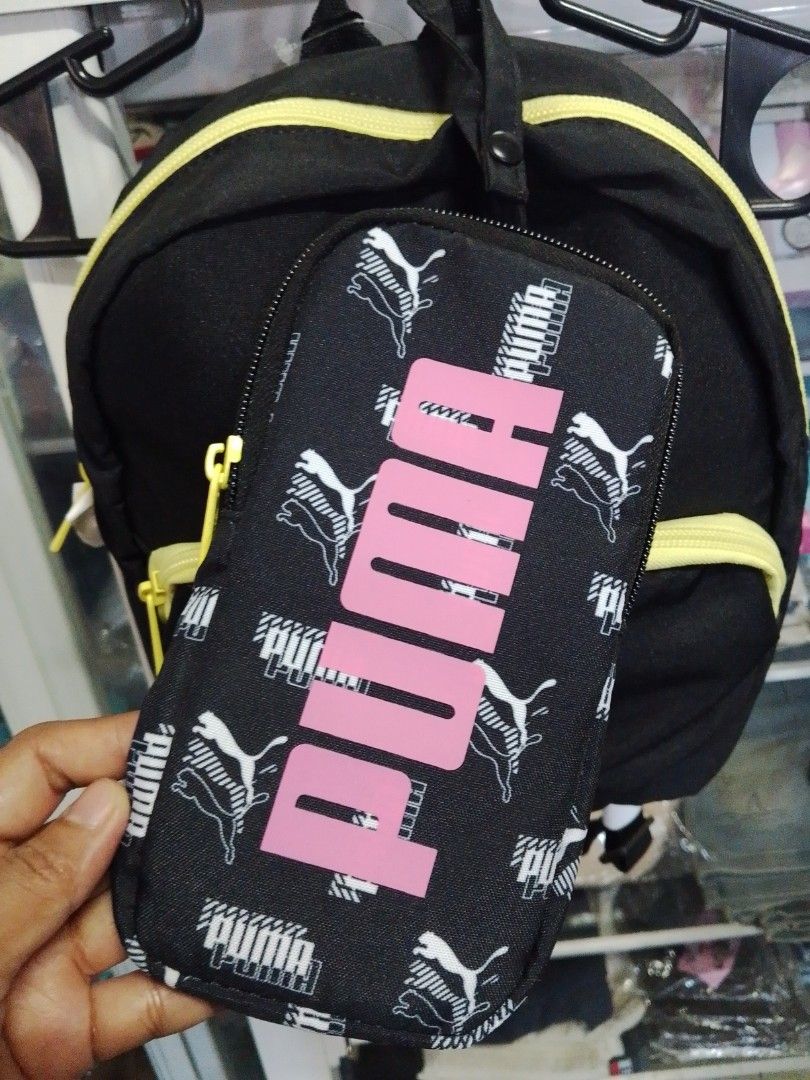Puma mod mini backpack (Category: Backpacks) located in Rizal. Submitted by abengpascua (Listing ID 1465177925, Image 2). Description: Puma Mini Backpack * Classic backpack silhouette * Main zip pocket * Front pockets *Adjustable shoulder strap * Top carry handle * Cell Phone Pouch Attachment *9"L x 3"D x 10"H US BOUGHT🇺🇸🇺🇸.