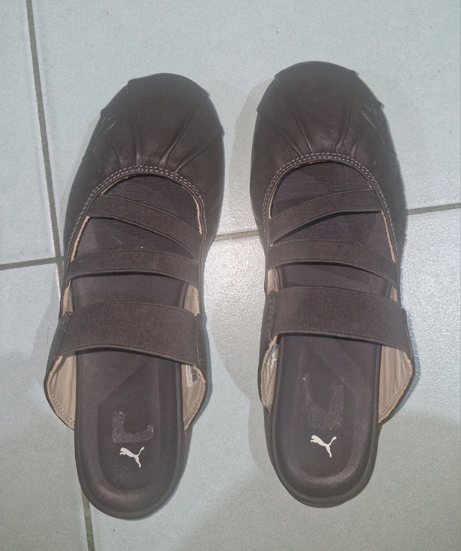 Puma Speedcat Mule (Category: Flats & Sandals) located in Pasig City. Submitted by rainbowbright8 (Listing ID 1465374827, Image 3). Description: - Brand: Puma - Style: Brown slip-on shoes with gathered leather-like texture - Fit & Comfort: Multiple elastic straps for a secure fit and a rounded toe design - Branding: Subtle debossed Puma cat logo on the front - Packaging: Includes original green Puma shoebox - Ideal for: Casual daily wear and walk