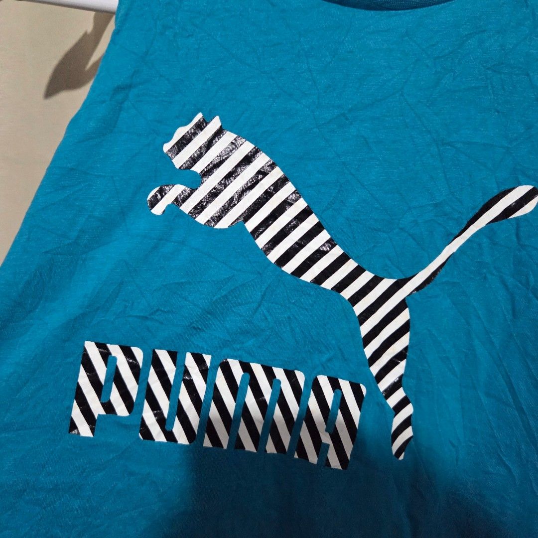 PUMA WOMEN TANK (Category: Activewear) located in Santiago. Submitted by fromboxes (Listing ID 1465316690, Image 2). Description: Like new S runs M Ships thru J&T Isabela North Luzon Shipping Nationwide No rush shipping 😊😊.