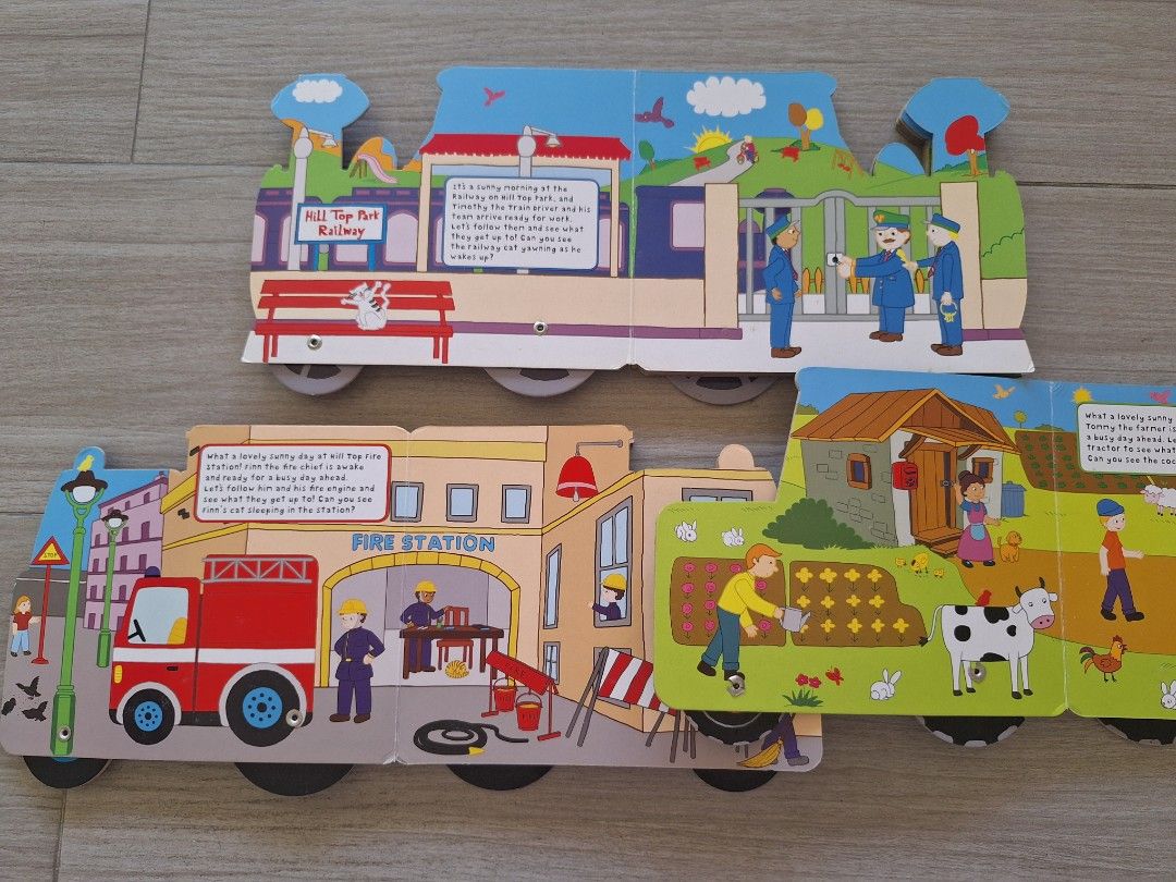 Push Me Along Vehicle Shaped Board Books (Category: Children's Books) located in Batangas. Submitted by tins_closet88 (Listing ID 1465212258, Image 2). Description: - Set of 3 vehicle-shaped board books: Timothy's Train, Finn's Fire Engine, and Tommy's Tractor - Features interactive, movable wheels that actually roll - Colourful illustrations with simple stories about daily routines (railway, fire station, farm) - Sturdy cardboard pages designed 
